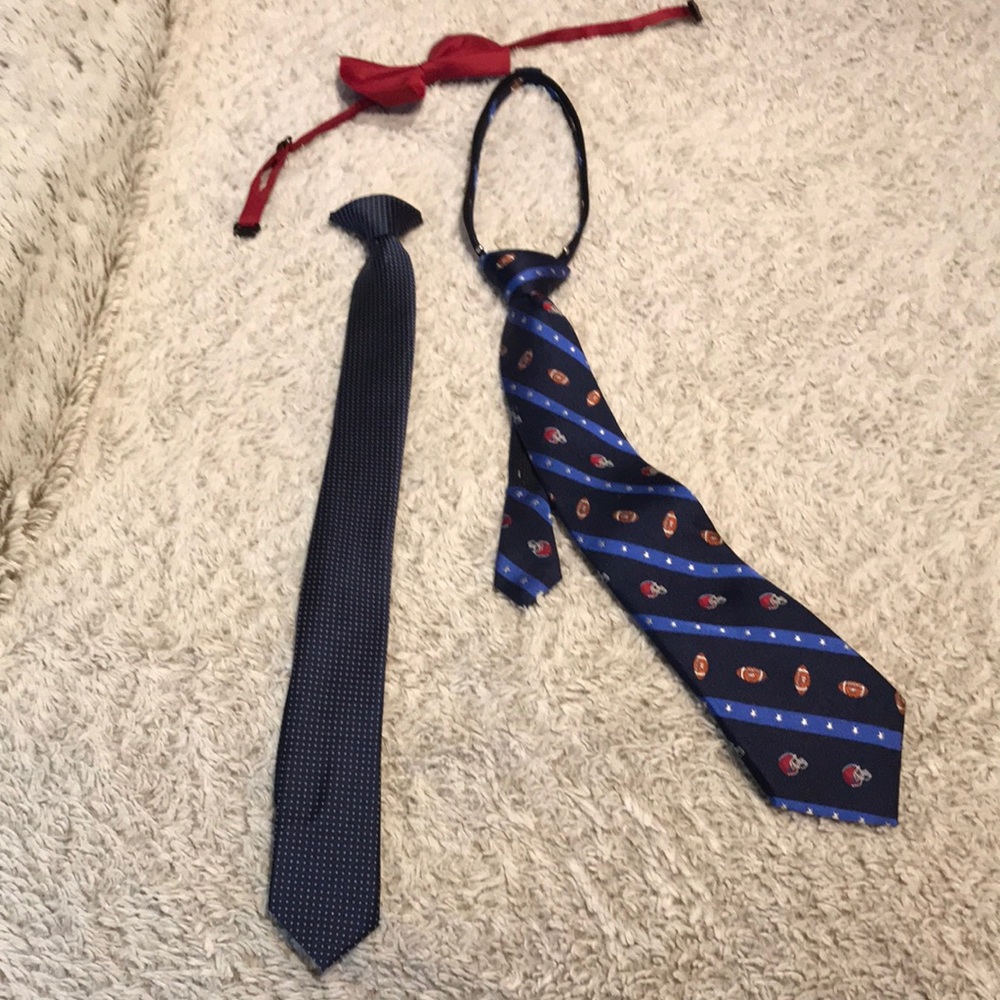 3 young boys ties.